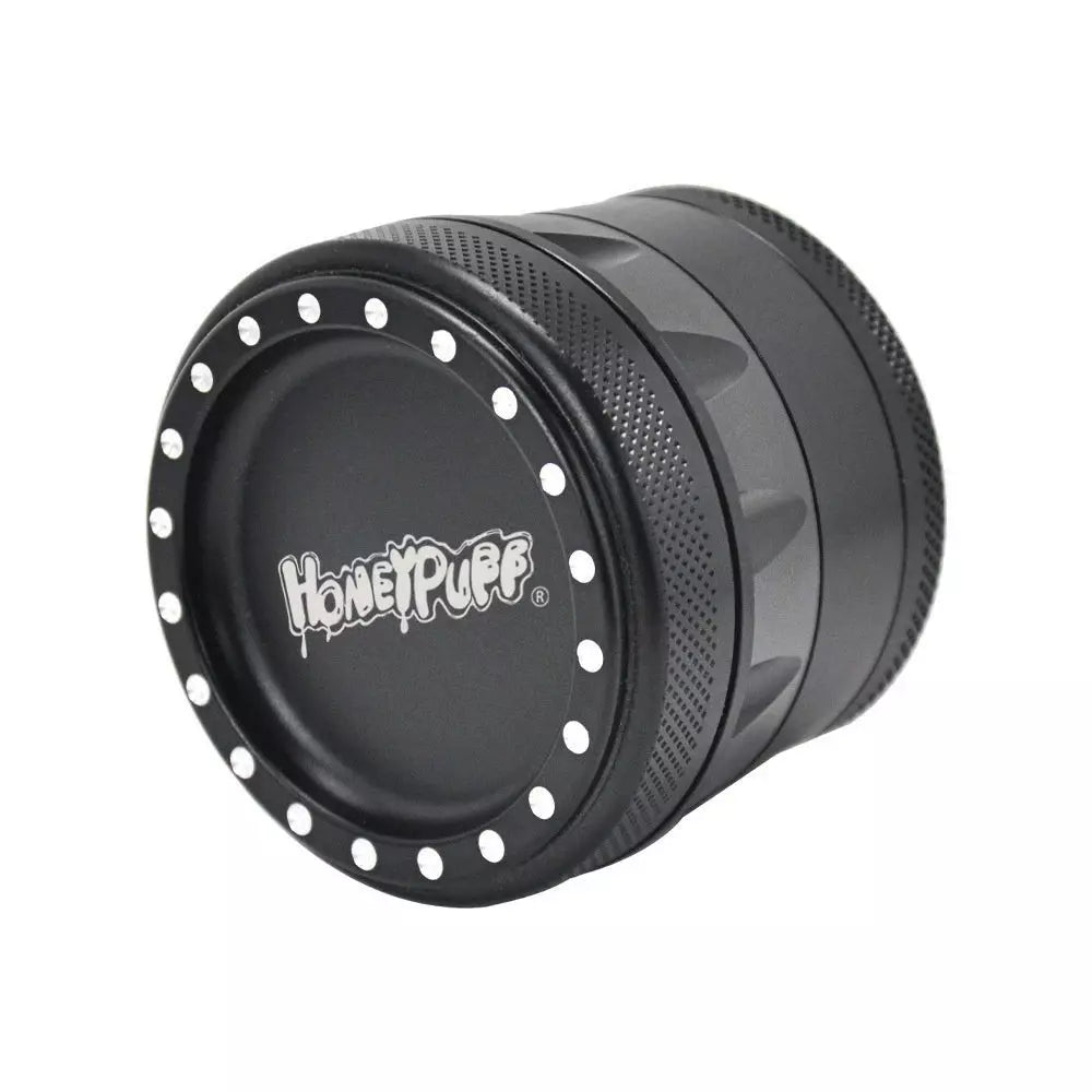 https://www.puffora.com/cdn/shop/files/BlackHoneyPuff63mmMetalHerbGrinder.webp?v=1699920563